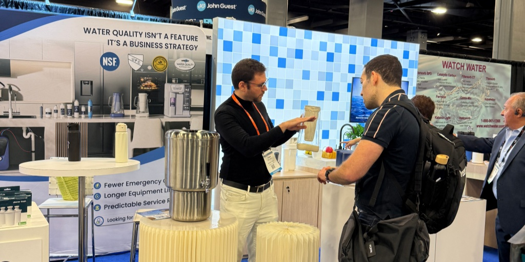 A Glacier Fresh staff is showing the products to customers